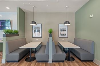 Clubroom with coffee bar, lounge seating and tv